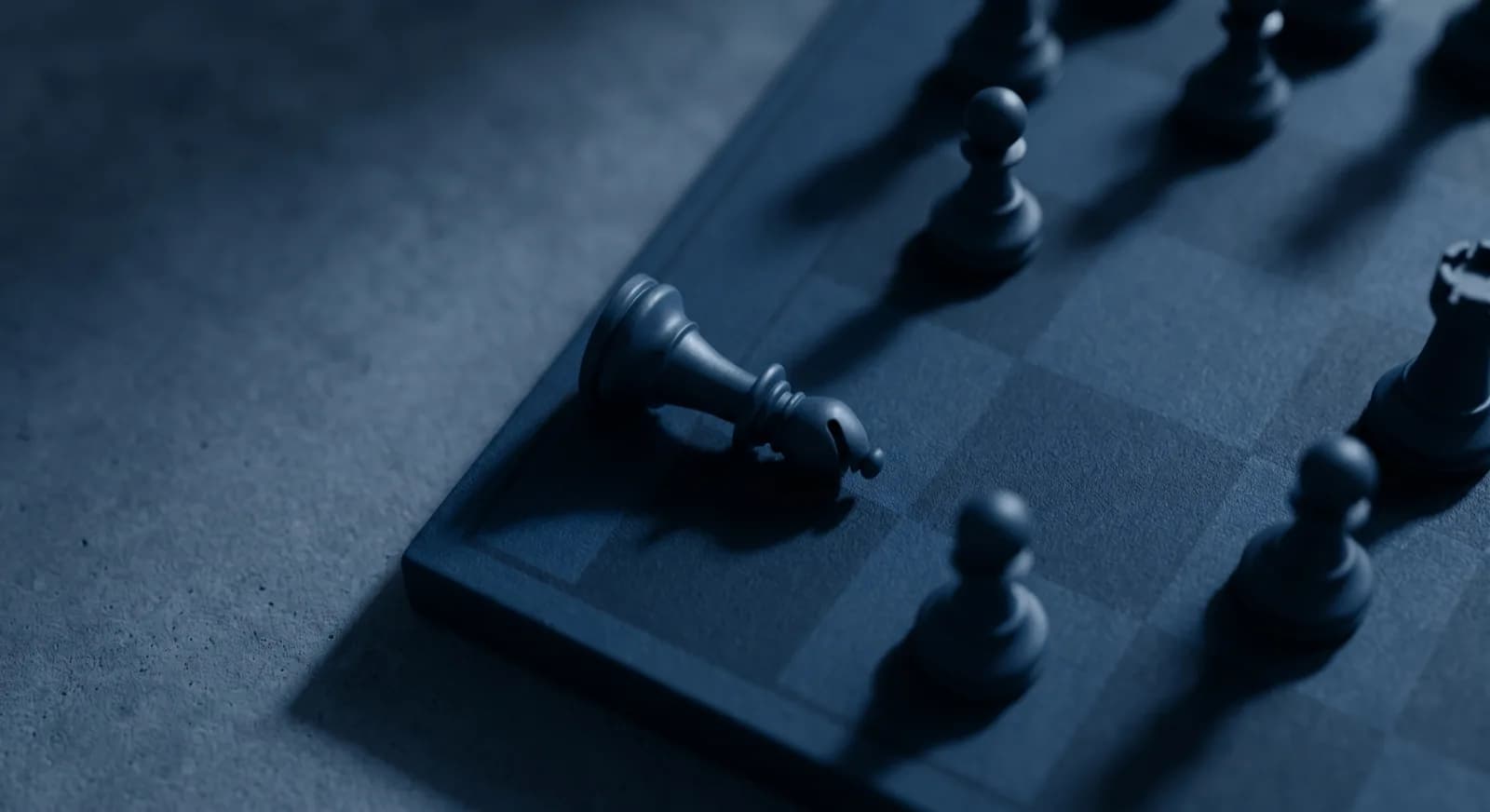 Top-down chess position with long analytical shadows and a tipped bishop